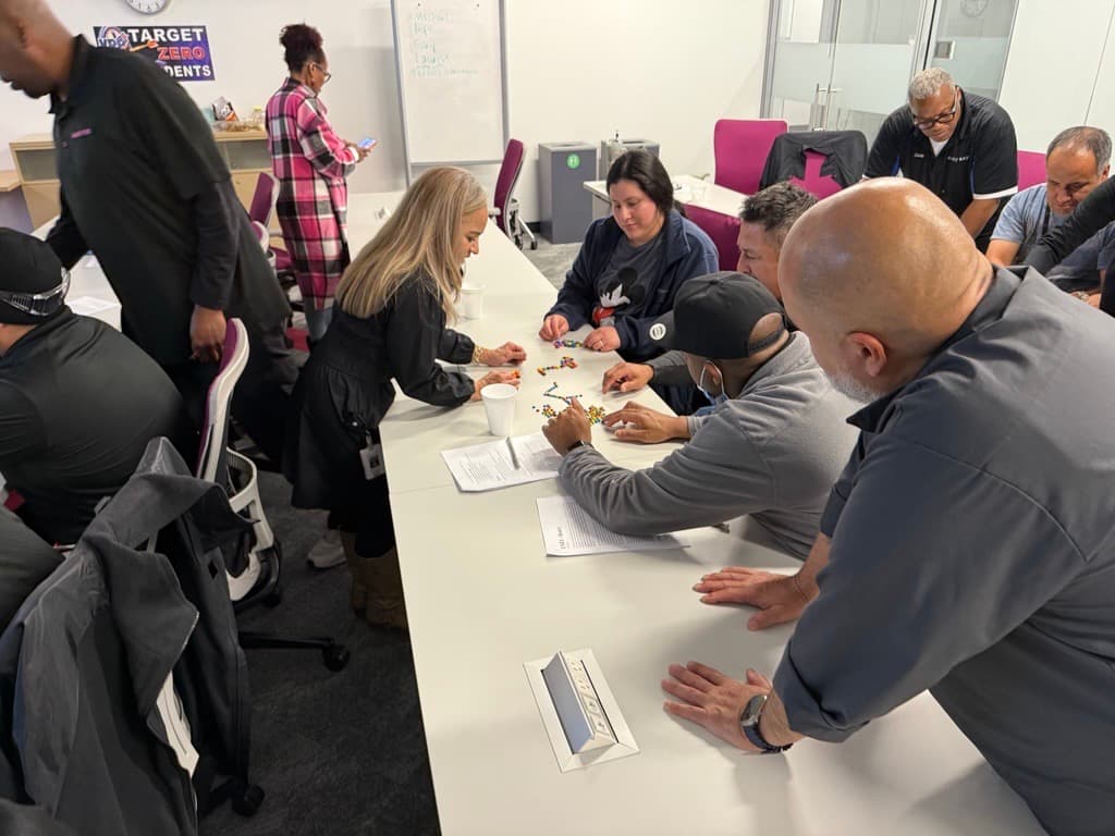 Operators collaborating on a hands-on team-building activity